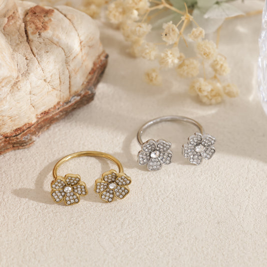 Bague double fleur sertie