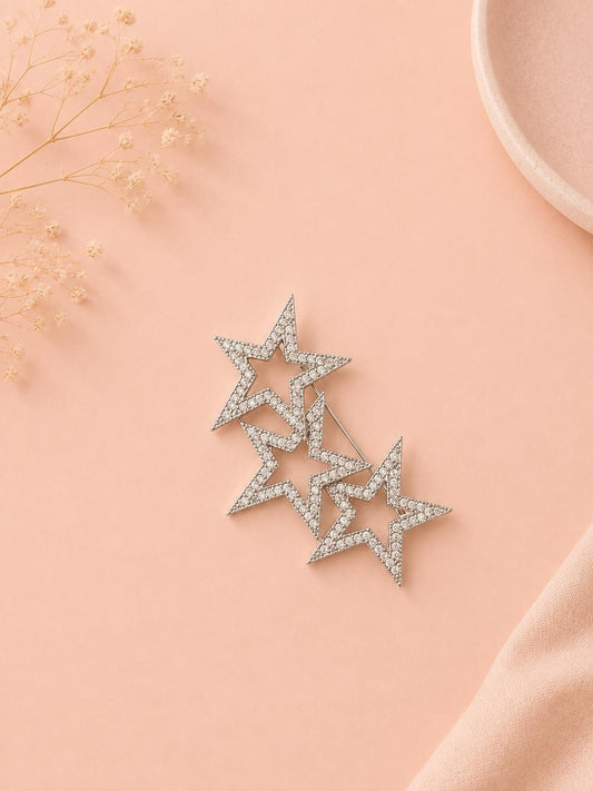 Broche trio d'étoiles pavées