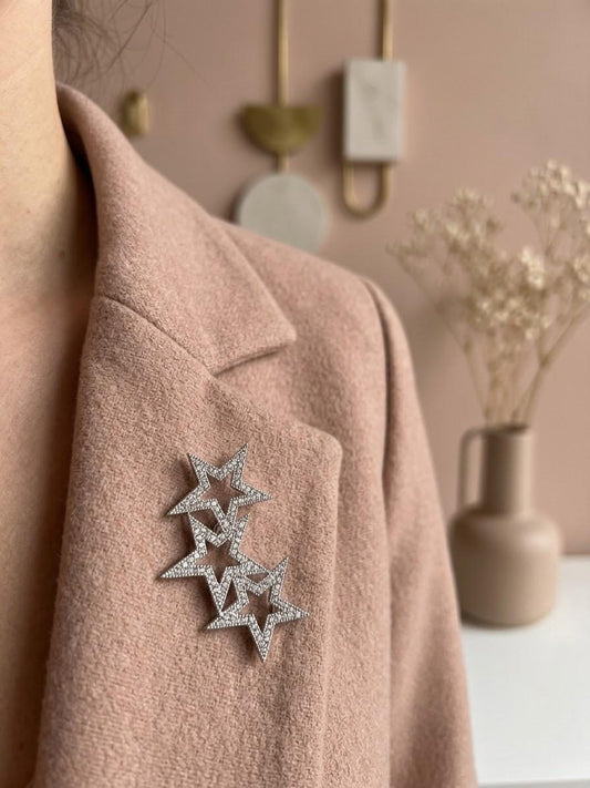 Broche trio d'étoiles pavées