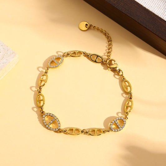 Bracelet chaîne maillon marine et médaillons sertis