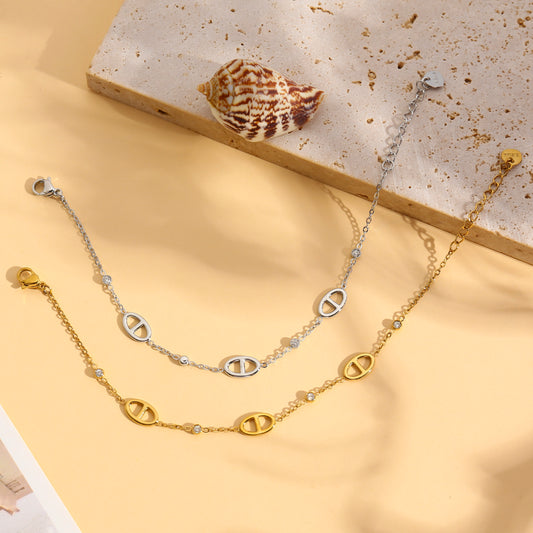Bracelet double chaîne maillon marine sertie