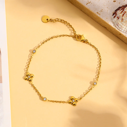 Bracelet chaîne fine trèfle serti