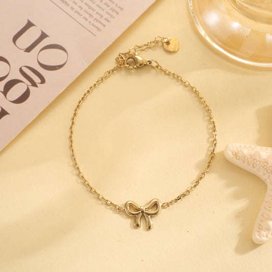 Bracelet chaîne fine nœud doré