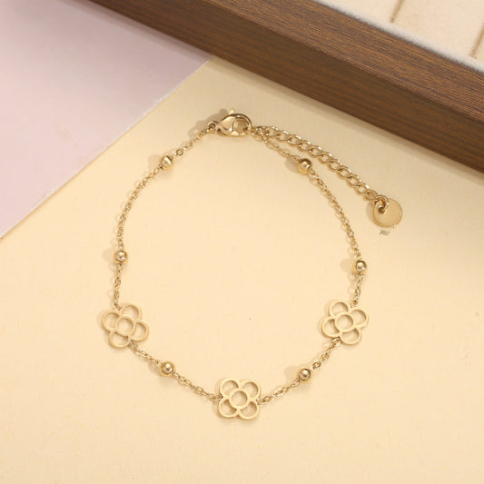 Bracelet chaîne fleurs fines ajourées