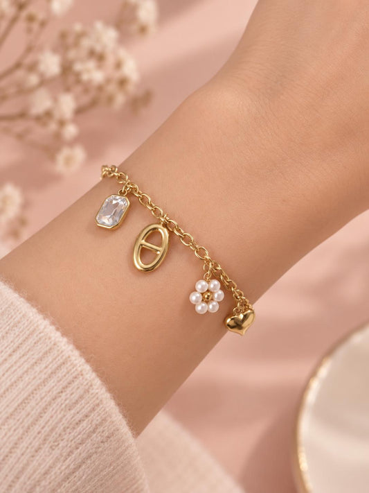 Bracelet doré breloques mixtes perle