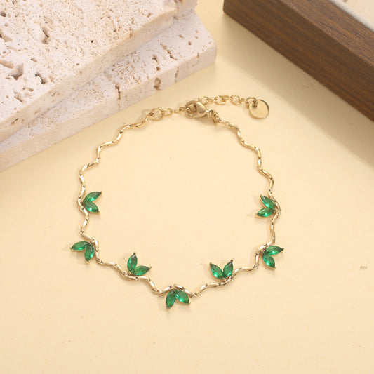 Bracelet chaîne vague feuilles serties