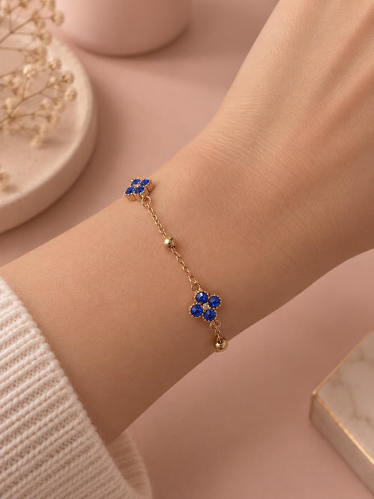Bracelet chaîne dorée trèfles sertis
