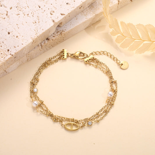 Bracelet multiples chaînes doré avec maille marine