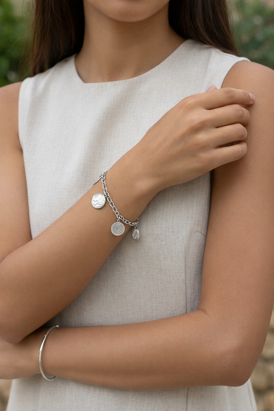 Bracelet à breloques médailles de visage