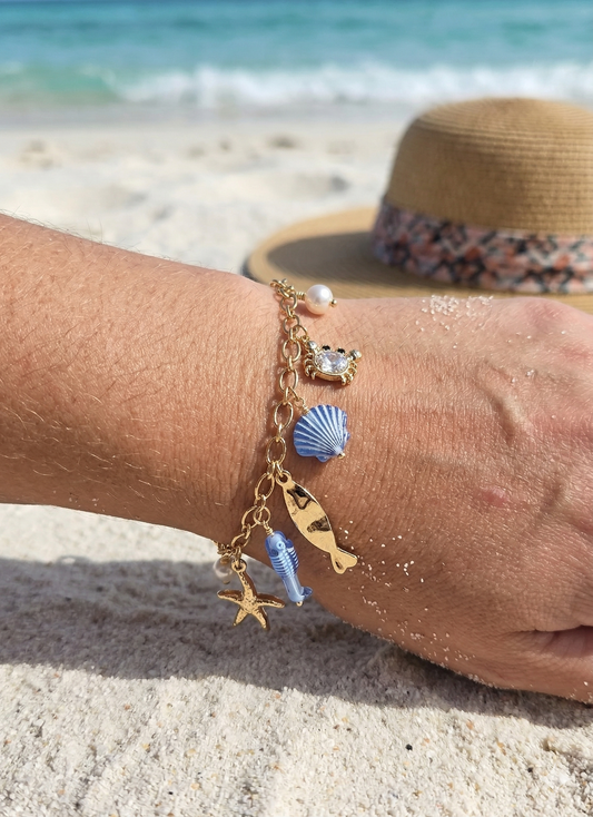 Bracelet doré charms marins bleus et crabe en strass