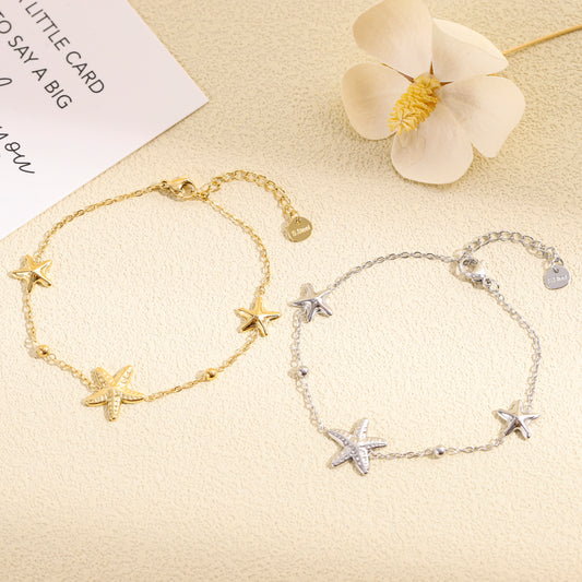 Bracelet doré fin 3 étoiles de mer