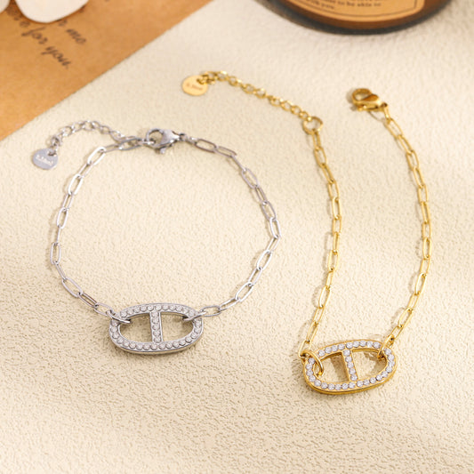 Bracelet maillon ovale ajouré et pavé