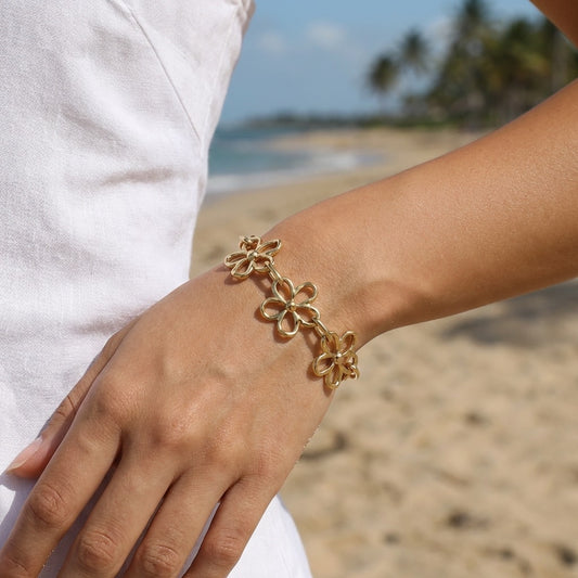 Bracelet chaîne maillons fleurs ajourées martélées