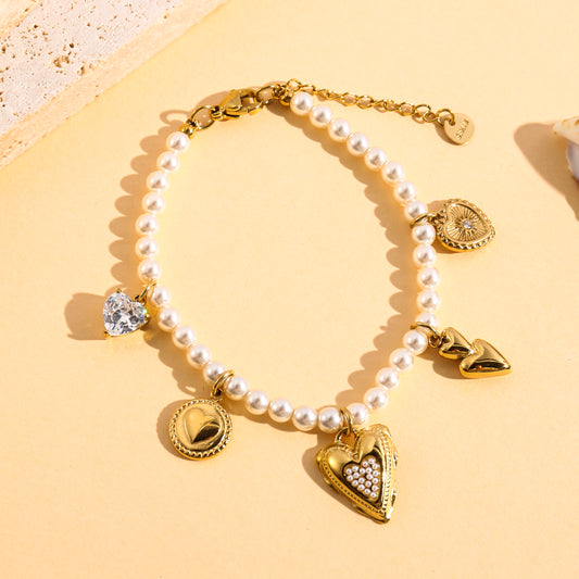 Bracelet doré chaîne perlée charms cœurs