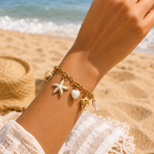 Bracelet doré charms étoile de mer, corail et cœur