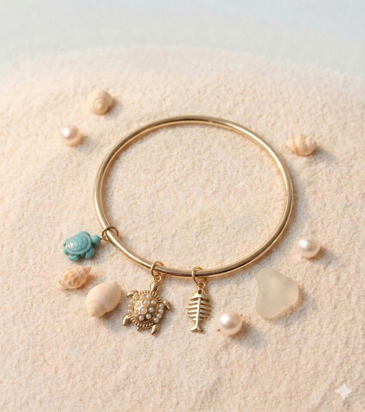 Bracelet jonc doré pendentif tortue perlée et bleue