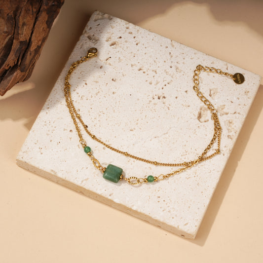 Bracelet doré double chaîne pierre verte