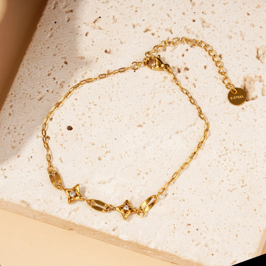 Bracelet chaîne dorée maillons ovales étoiles strass
