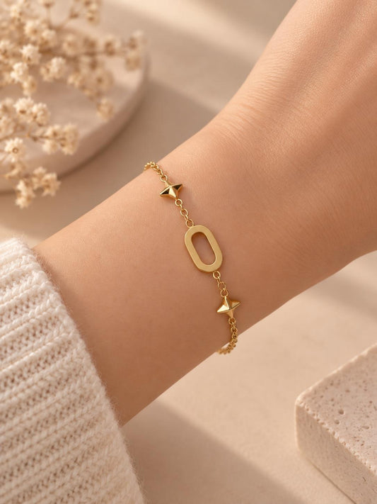 Bracelet chaîne dorée ovale et double étoiles