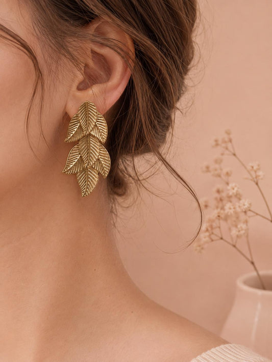 Boucles d'oreilles feuilles tropicales superposées