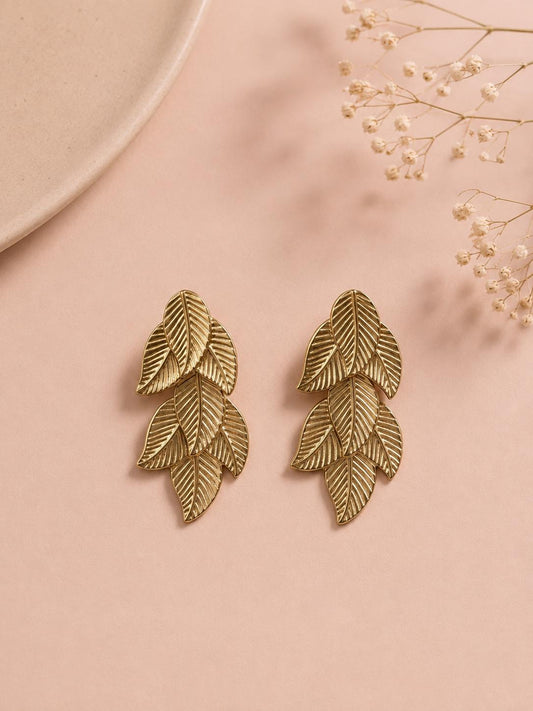 Boucles d'oreilles feuilles tropicales superposées