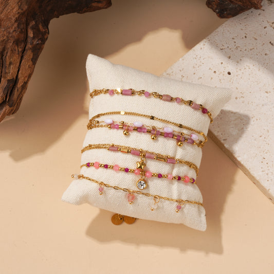 Lot de 6 bracelets dorées à pierres rose