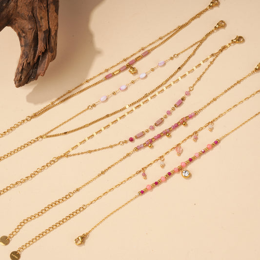 Lot de 6 bracelets dorées à pierres rose