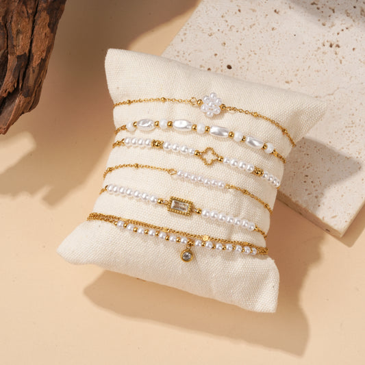 Lot de 6 bracelets dorées à perles et strass