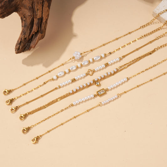 Lot de 6 bracelets dorées à perles et strass