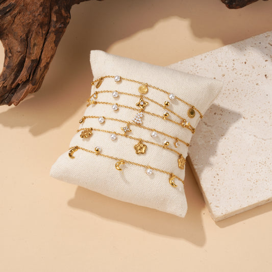Lot de 6 bracelets dorées à perles et constellations