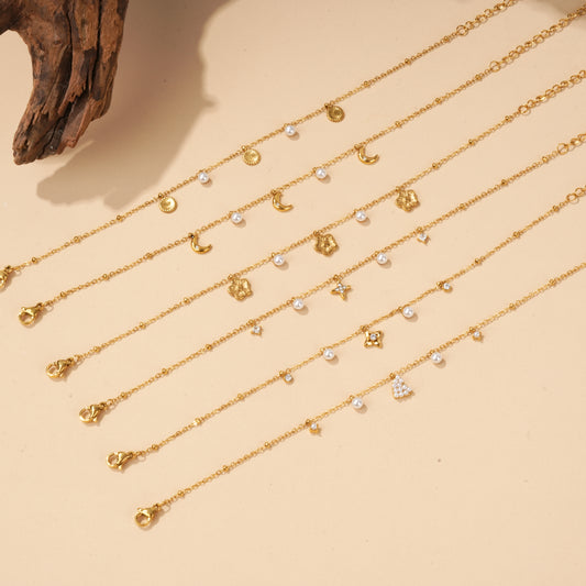 Lot de 6 bracelets dorées à perles et constellations