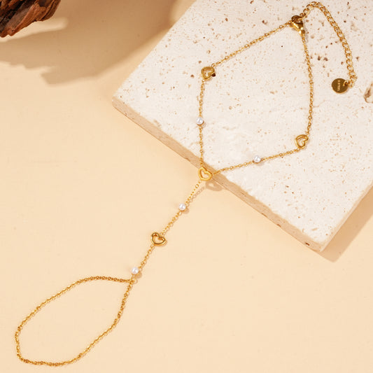 Bracelet-bague chaîne cœurs et perles