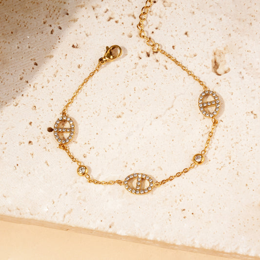 Bracelet chaîne fine maille marine serti