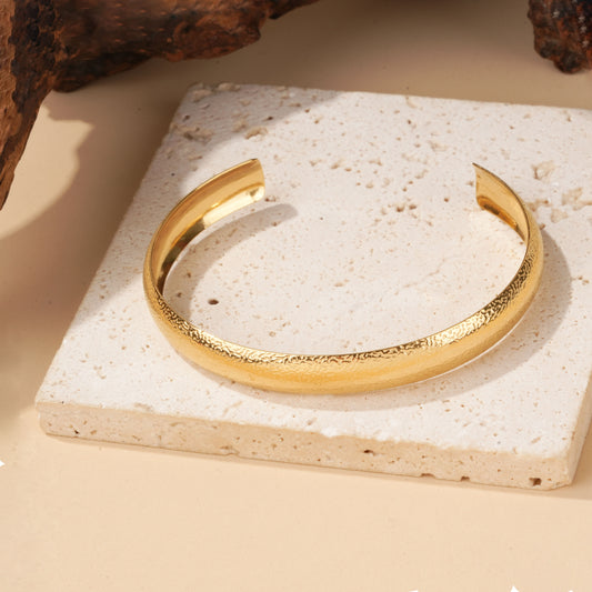 Bracelet jonc doré écaillé
