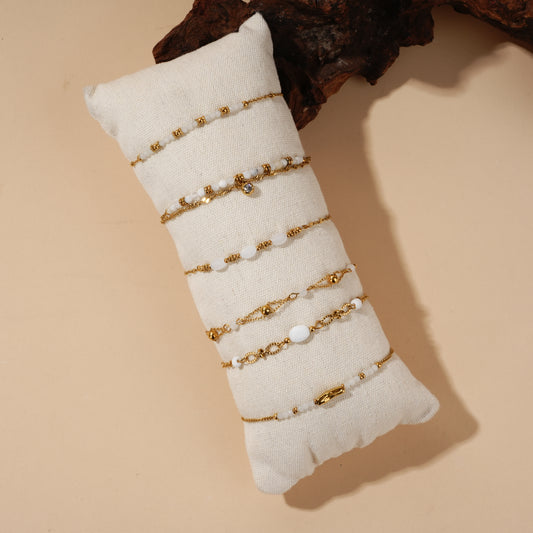 Lot de bracelets dorés pierres naturelles blanches