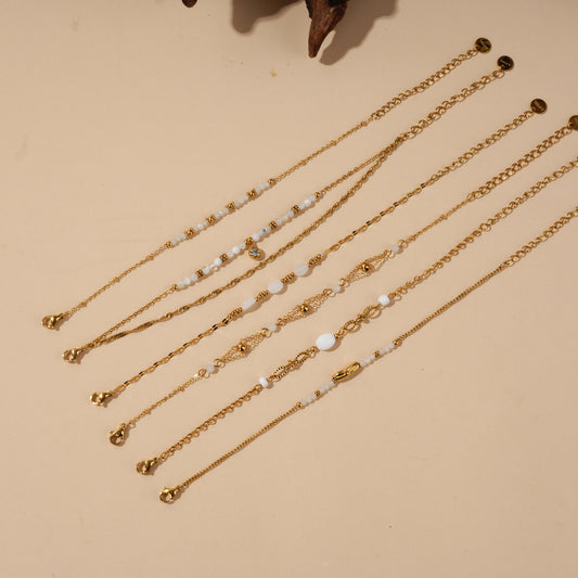 Lot de bracelets dorés pierres naturelles blanches