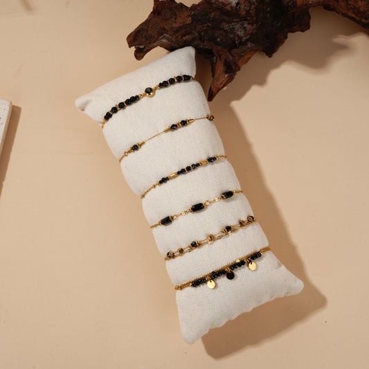 Lot de bracelets dorés pierres naturelles noires