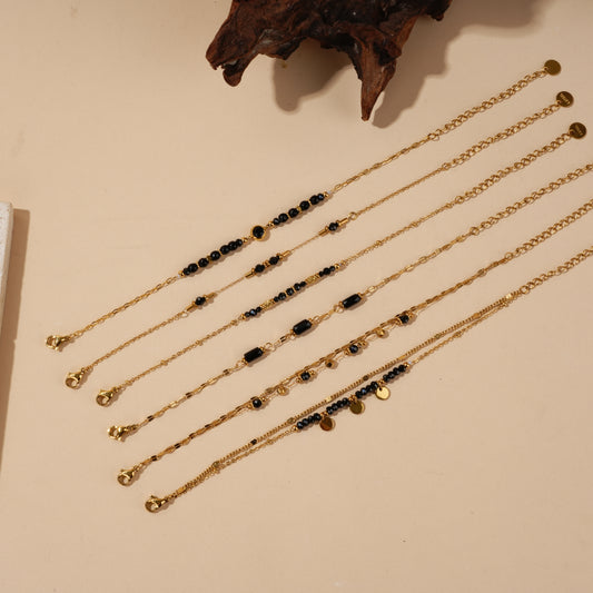 Lot de bracelets dorés pierres naturelles noires