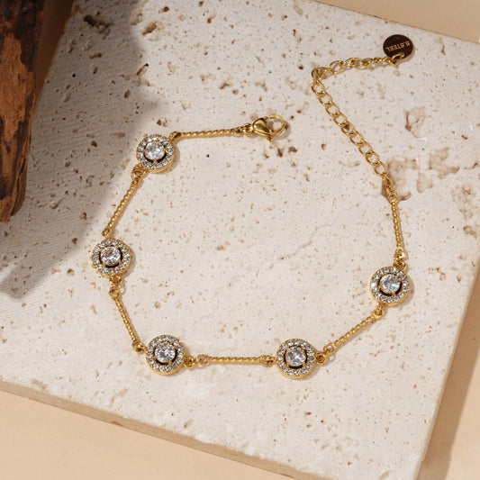 Bracelet chaîne médaillons sertis