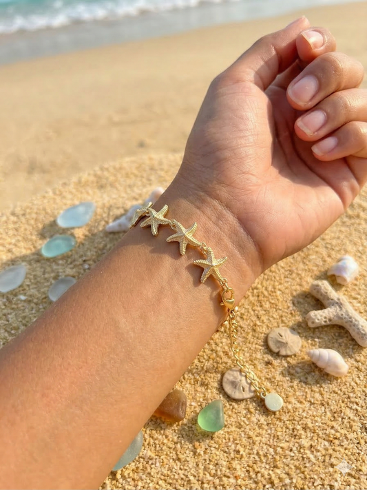 Bracelet doré chaîne étoiles de mer effet relief