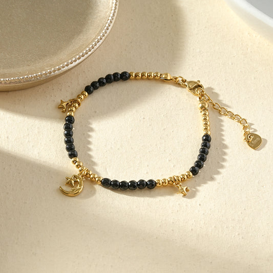 Bracelet perles noires facettée thème constellation