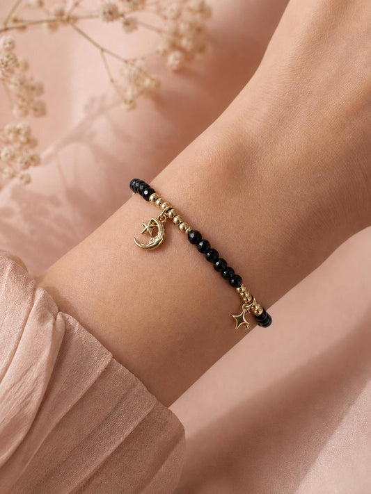 Bracelet perles noires facettée thème constellation