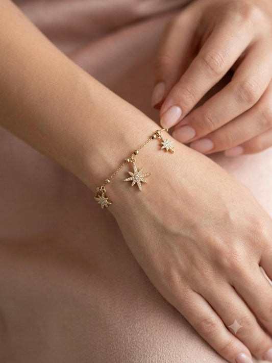 Bracelet chaîne étoiles scintillantes pendantes