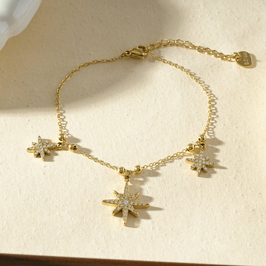 Bracelet chaîne étoiles scintillantes pendantes
