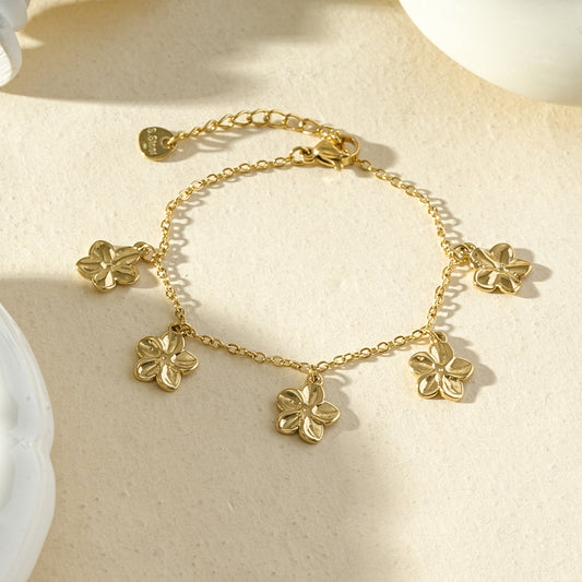Bracelet pendant fleurs polies