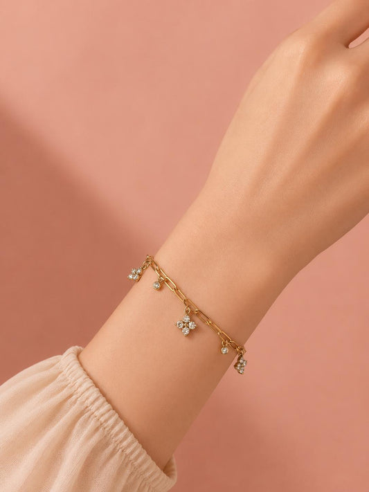 Bracelet chaîne trombone à trèfles sertis