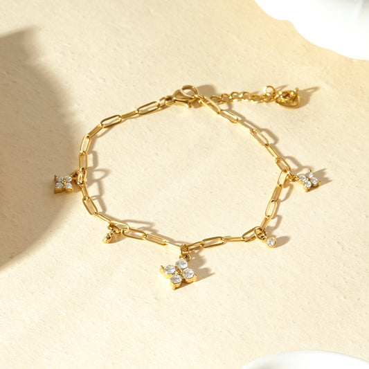 Bracelet chaîne trombone à trèfles sertis