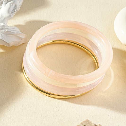 Lot de 4 bracelets jonc doré et résine rose
