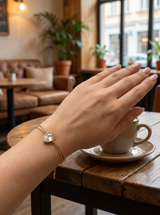 Bracelet double chaîne avec strass goutte