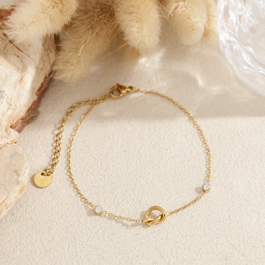 Bracelet chaîne fine nœud serti